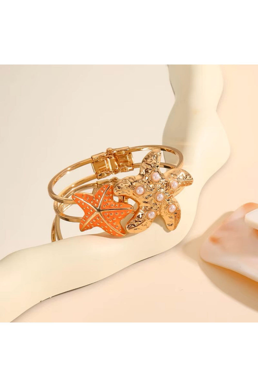 A SEA STAR IS BORN BANGLE ORANGE