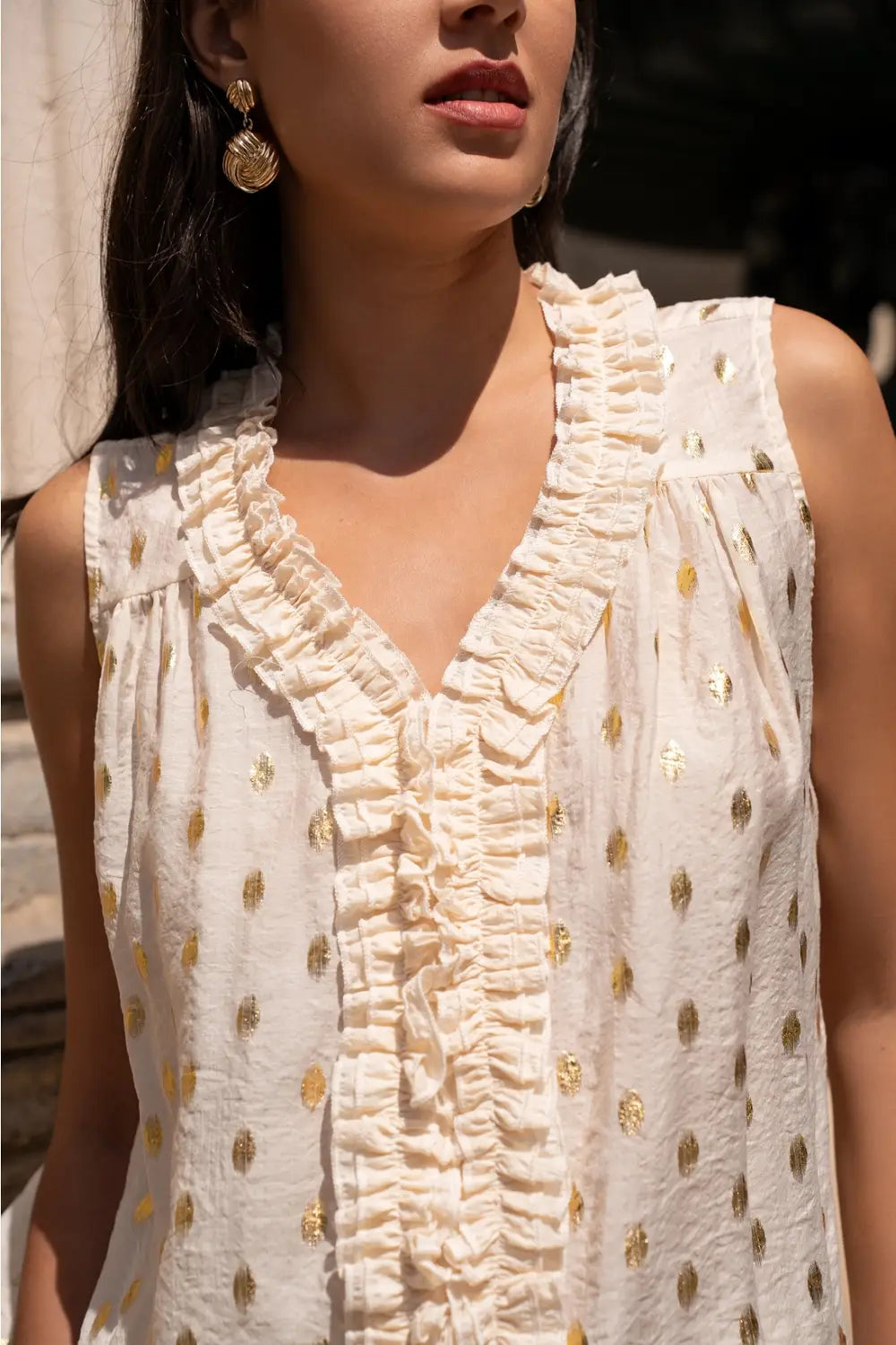 IT'S GOLDEN SLEEVELESS BLOUSE