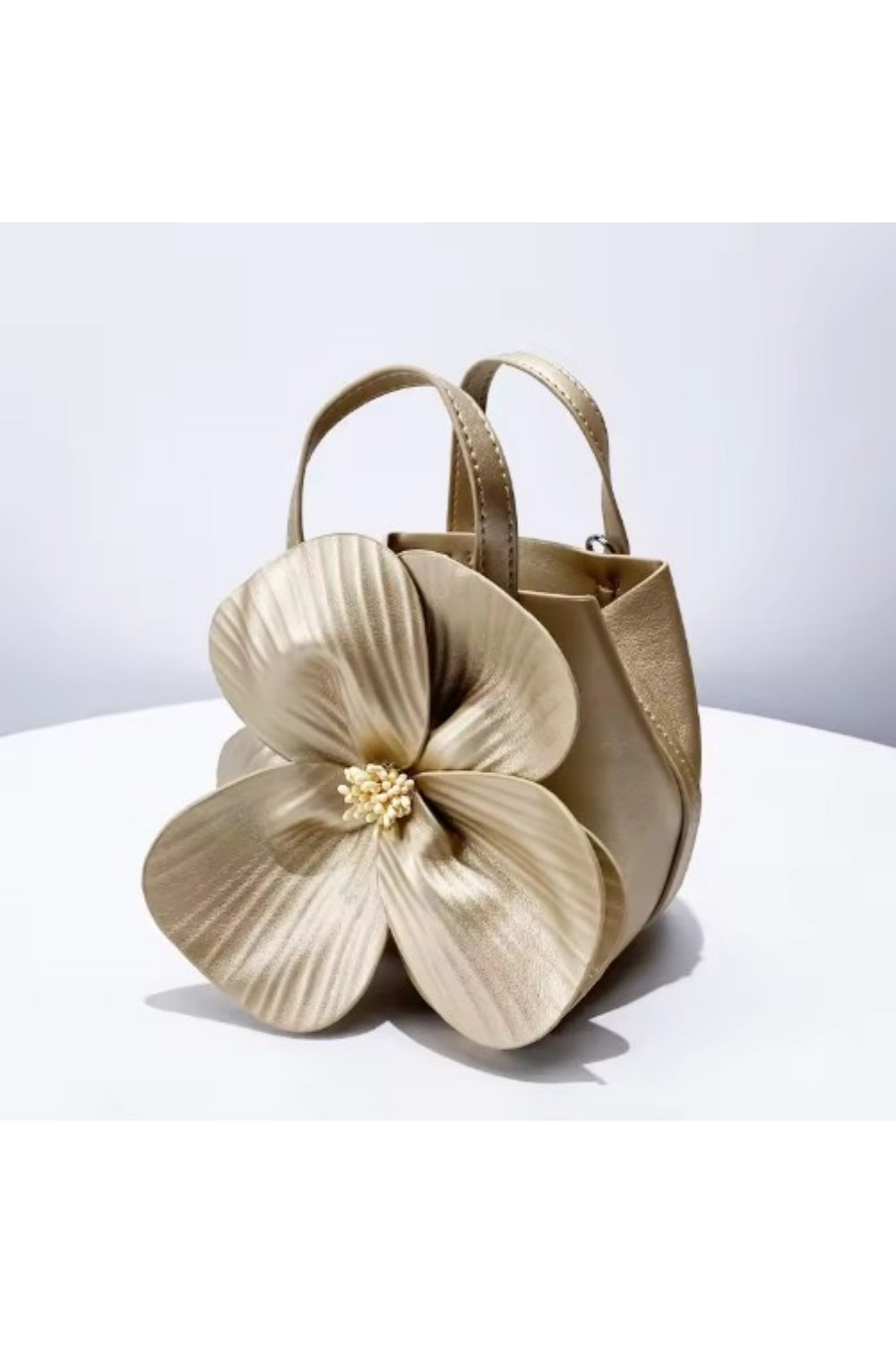HE LOVES ME NOT TOTE GOLD