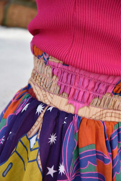 LET THEM TALK MINI SKIRT