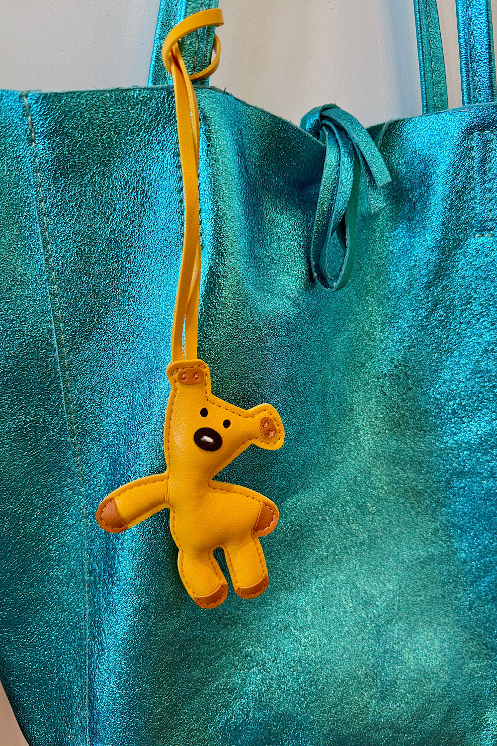 BAG CHARM TED MUSTARD